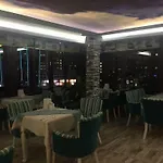 Ar *